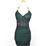 Зеленое мини-платье с золотыми вставками  - Платья