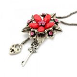 Металлическое ожерелье с цветочком и стразами - Подвески и ожерелья