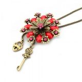 Металлическое ожерелье с цветочком и стразами - Подвески и ожерелья
